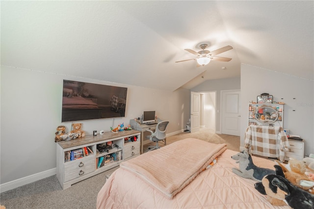 carpeted bedroom with ceiling fan and vaulted ceiling