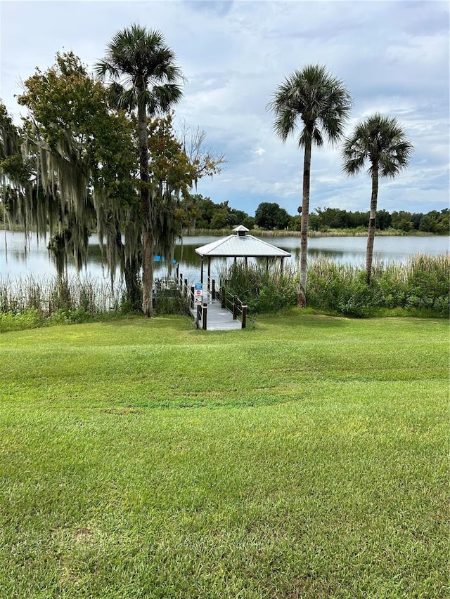 104 Turtle Run, Umatilla, FL 32784 - view of grassy yard with a gazebo and a water view