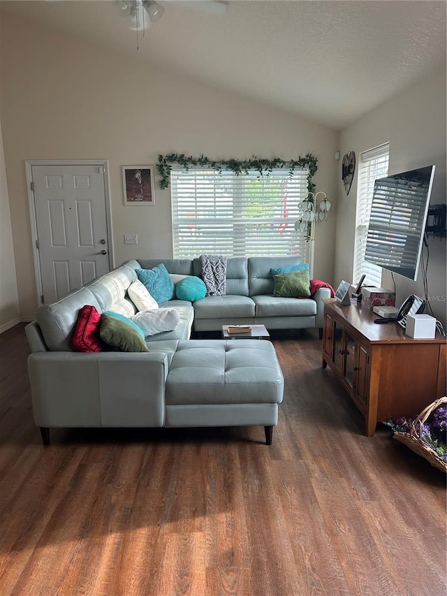 104 Turtle Run, Umatilla, FL 32784 - living area with vaulted ceiling, dark wood-style flooring, and a ceiling fan