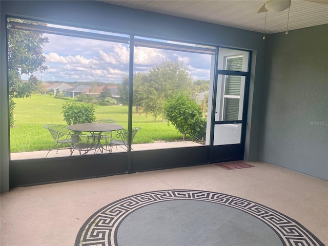 entryway featuring carpet flooring