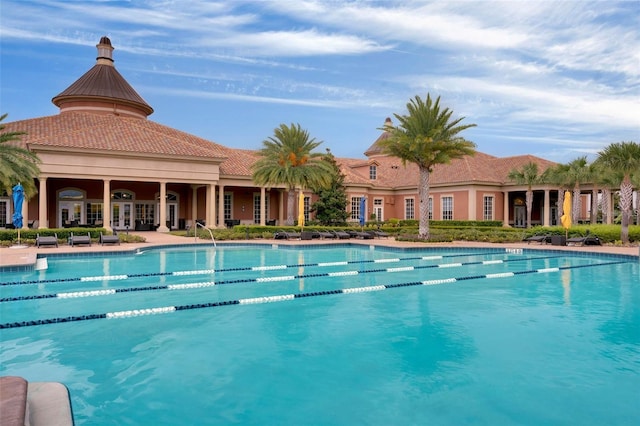 view of swimming pool with a patio area