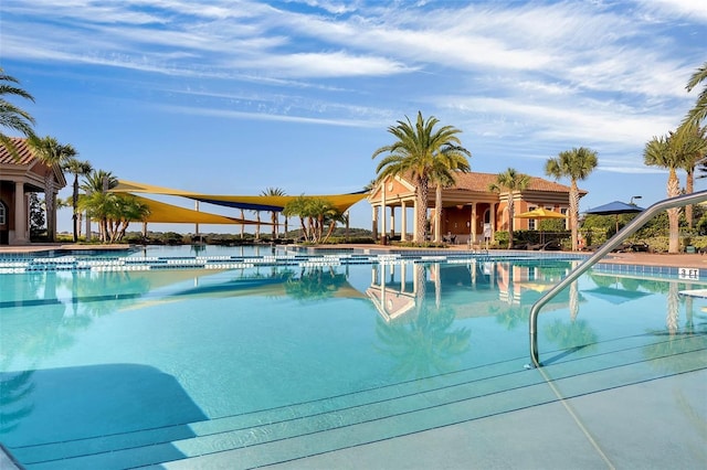 view of swimming pool featuring a patio area