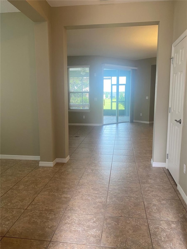 spare room with tile patterned flooring