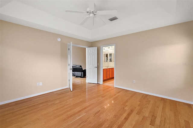 unfurnished room featuring ceiling fan and light wood-type flooring