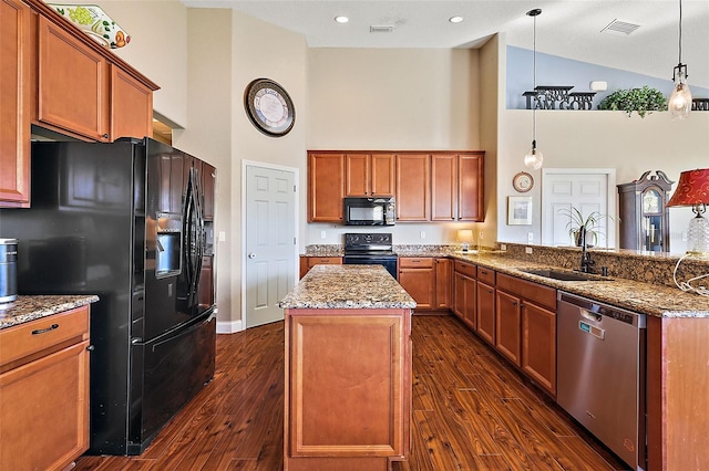 kitchen with kitchen peninsula, black appliances, sink, high vaulted ceiling, and pendant lighting