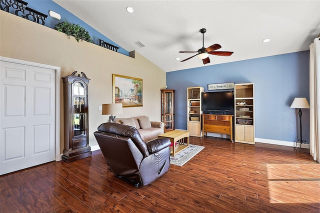 living room with lofted ceiling, dark hardwood / wood-style floors, and ceiling fan