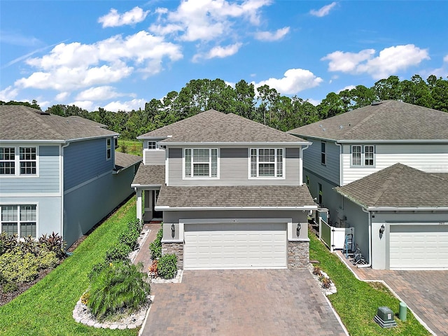 front of property featuring a garage