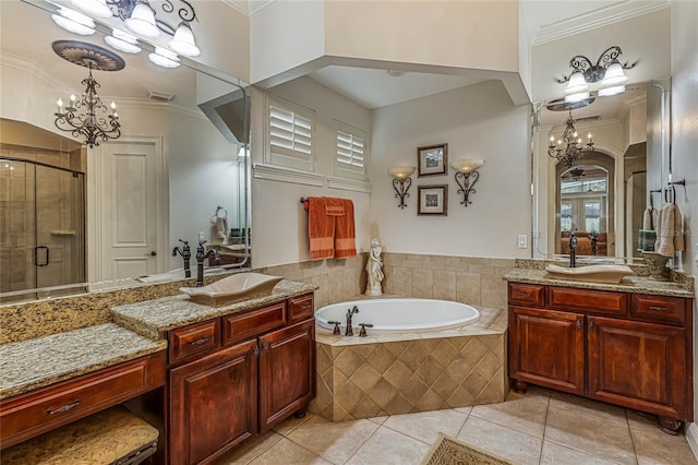 bathroom with vanity, tile patterned flooring, an inviting chandelier, plus walk in shower, and ornamental molding