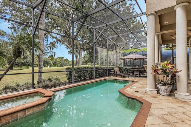 view of pool featuring an in ground hot tub, a lanai, and a patio area