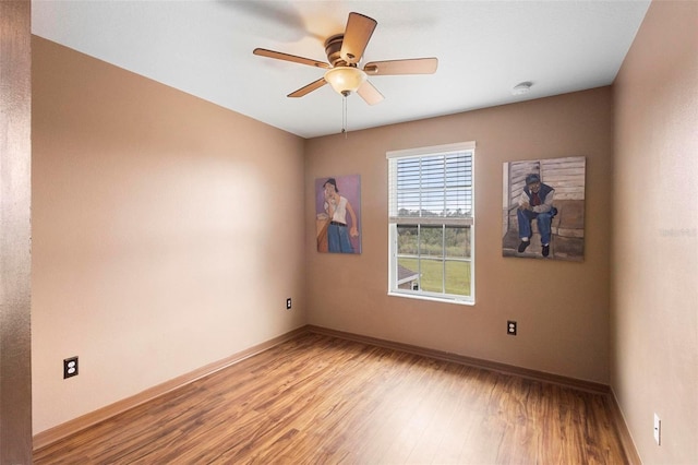 unfurnished room with light wood-type flooring and ceiling fan