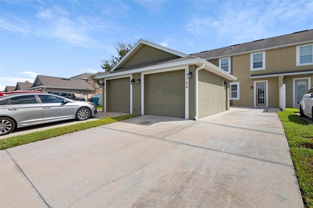 view of property exterior featuring a garage