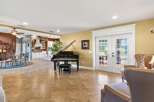 interior space featuring french doors and ceiling fan