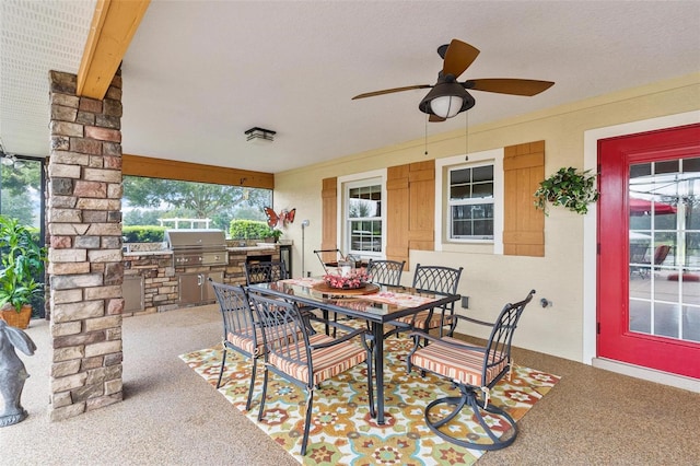 view of patio / terrace featuring area for grilling, ceiling fan, and grilling area