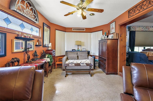 living room featuring ceiling fan