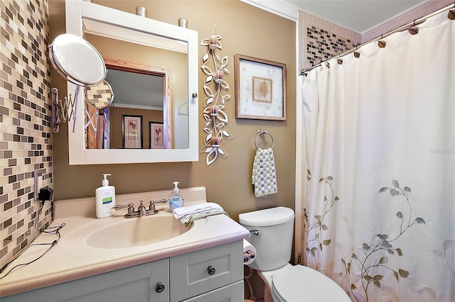 bathroom with backsplash, vanity, crown molding, toilet, and a shower with curtain