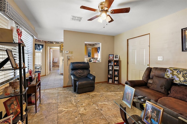 living room with ceiling fan