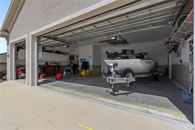 garage featuring a garage door opener