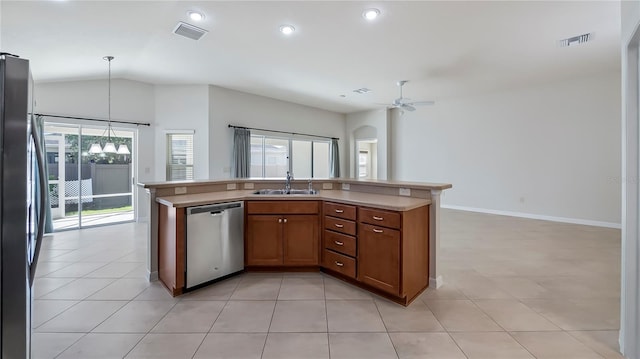 kitchen with ceiling fan, decorative light fixtures, stainless steel appliances, and plenty of natural light