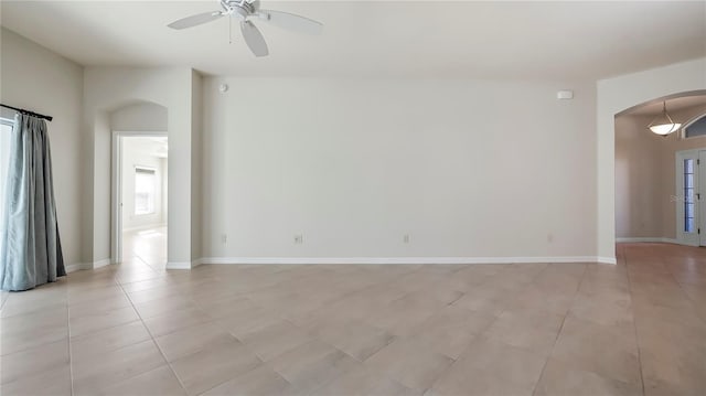 spare room featuring ceiling fan