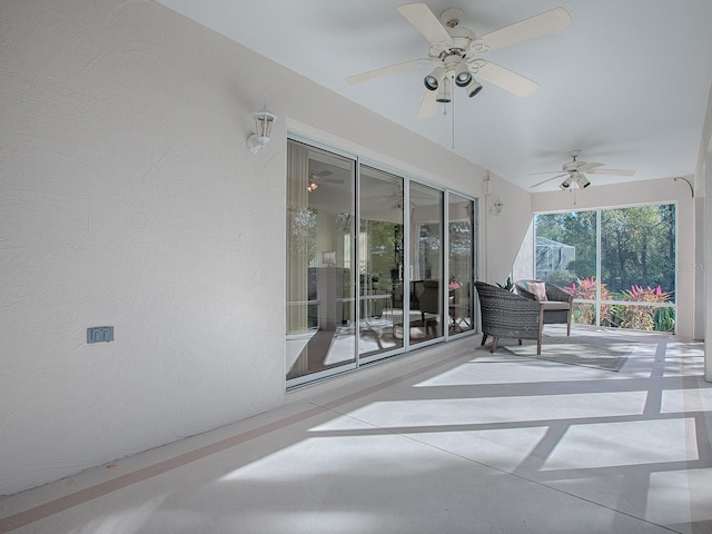 view of patio with ceiling fan