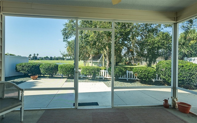 entryway with a textured ceiling