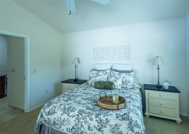 carpeted bedroom featuring ceiling fan and lofted ceiling