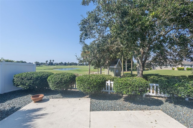 view of patio featuring a water view