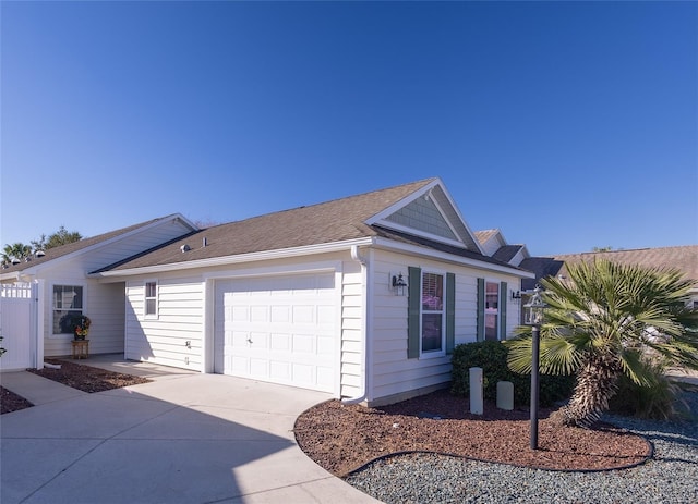 view of side of property featuring a garage