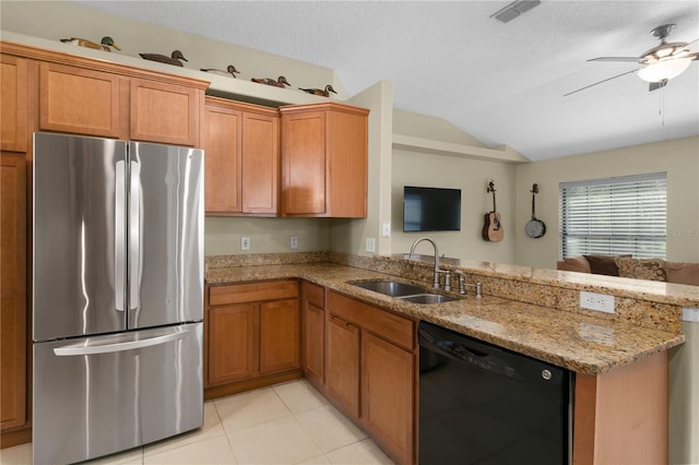 kitchen with kitchen peninsula, stainless steel fridge, dishwasher, and sink