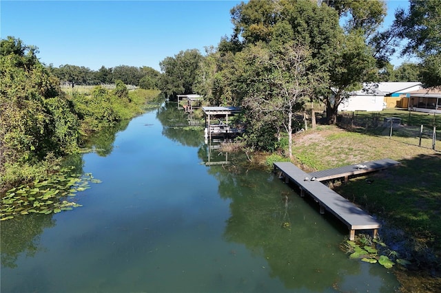 view of dock with a water view