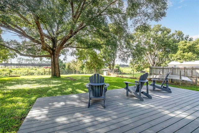 deck featuring a yard