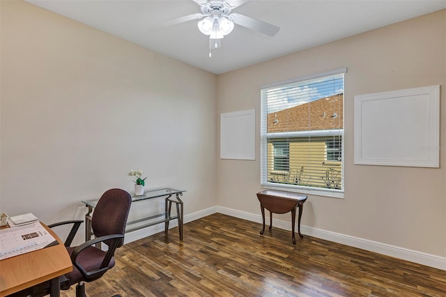 home office featuring ceiling fan and dark hardwood / wood-style floors