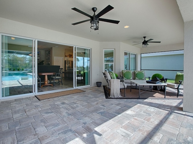 view of patio / terrace featuring outdoor lounge area and ceiling fan