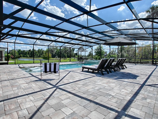 view of patio / terrace featuring pool water feature and a lanai