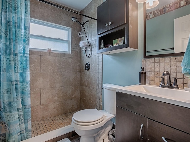 bathroom featuring backsplash, walk in shower, vanity, and toilet