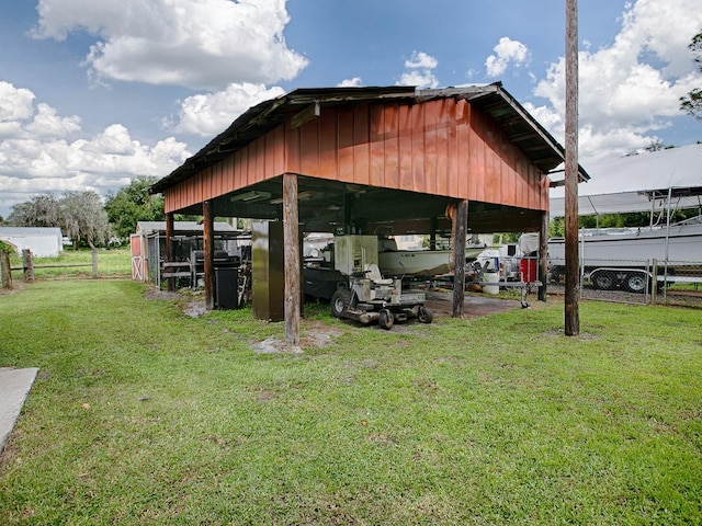 view of outdoor structure with a lawn