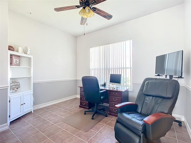 tiled office space with ceiling fan