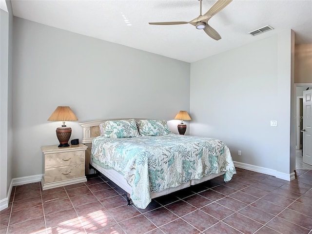 tiled bedroom with ceiling fan