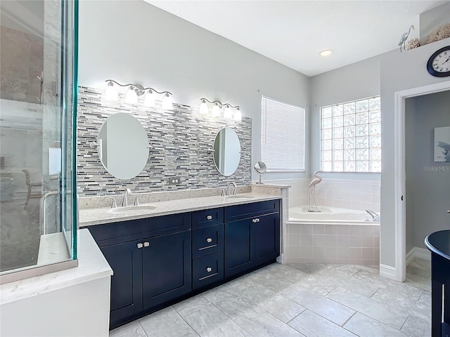 bathroom with plus walk in shower and vanity