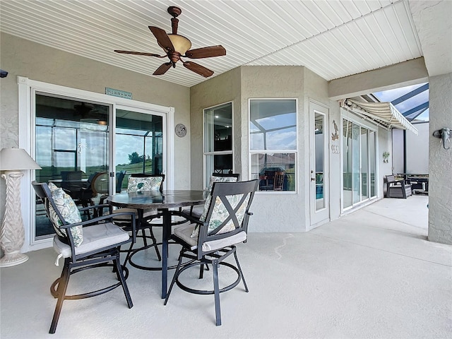 view of patio / terrace featuring ceiling fan