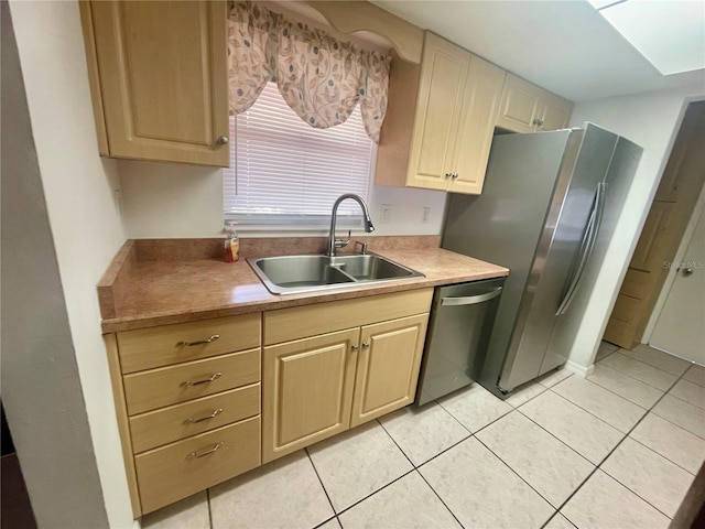 1415 Harnden Rd W, Port Orange, FL 32129 - kitchen featuring a sink, stainless steel appliances, and light tile patterned flooring