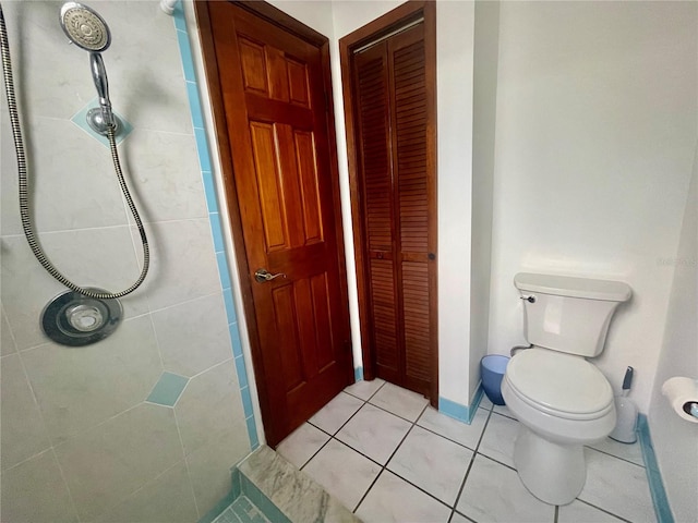 1415 Harnden Rd W, Port Orange, FL 32129 - bathroom featuring tile patterned floors, a closet, and toilet