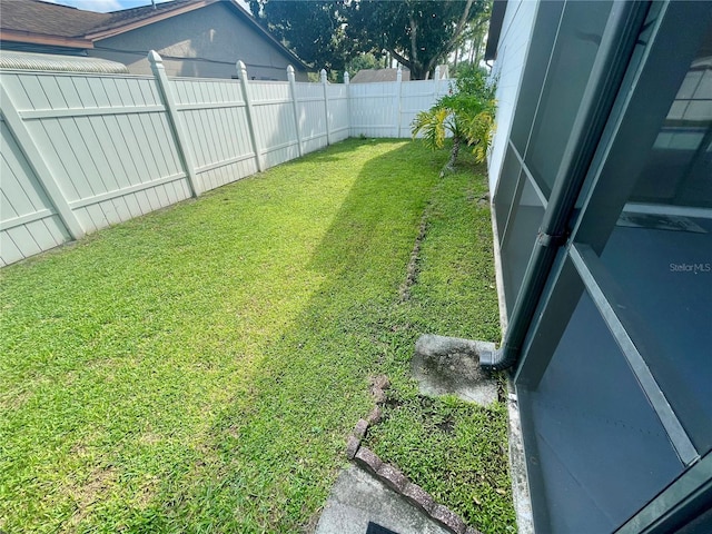 1415 Harnden Rd W, Port Orange, FL 32129 - view of yard featuring a fenced backyard