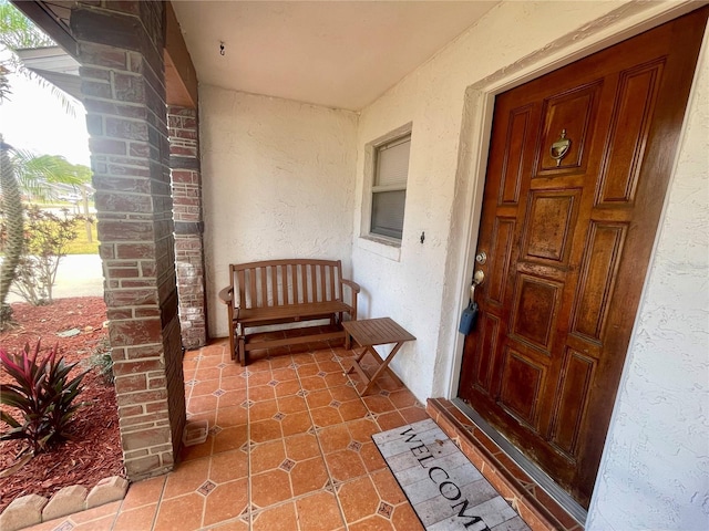 1415 Harnden Rd W, Port Orange, FL 32129 - property entrance with stucco siding