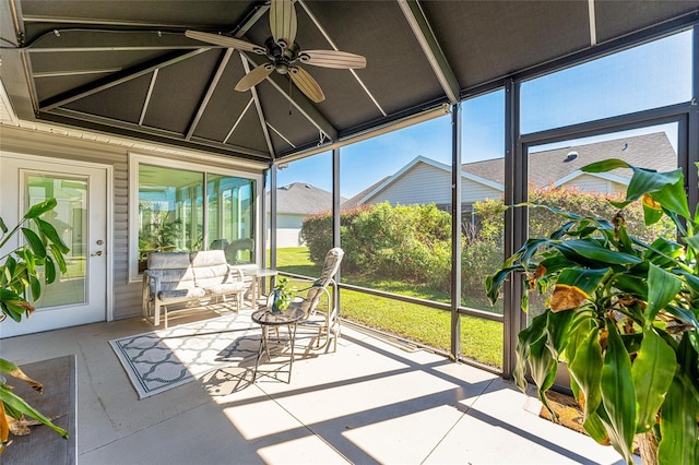 sunroom / solarium with ceiling fan