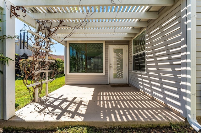 view of patio featuring a pergola