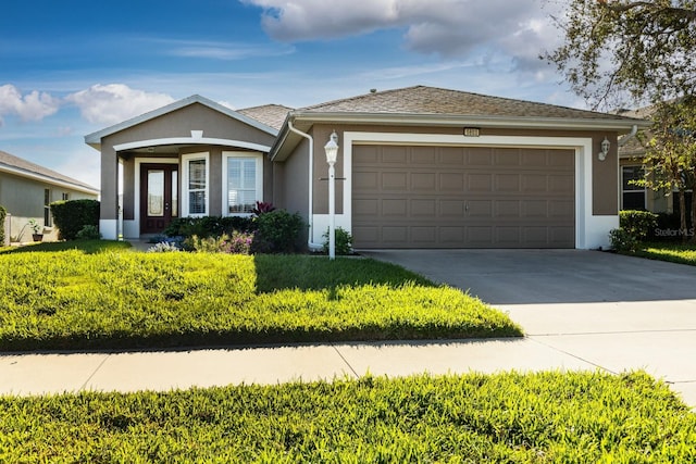 ranch-style home featuring a garage