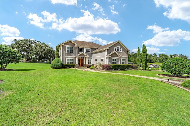 view of front of home with a front lawn