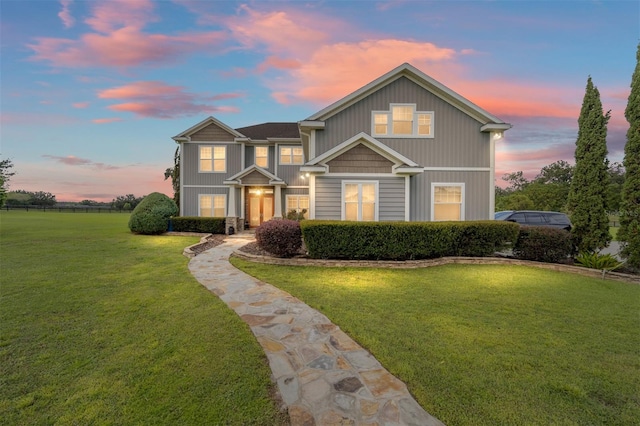 view of front of home with a yard