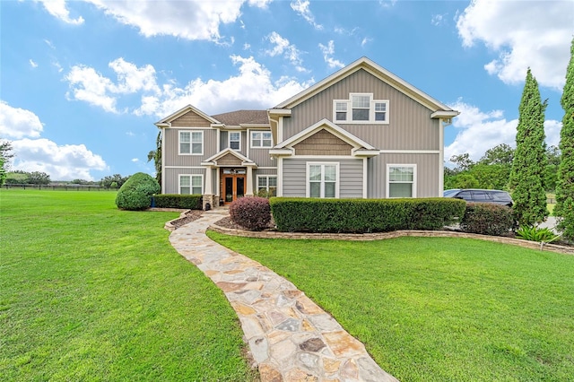 view of front of home featuring a front yard